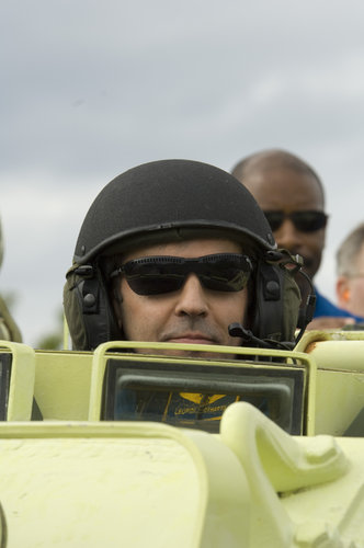 Léopold Eyharts practices driving an emergency evacuation vehicle during training at Kennedy Space Center, Florida