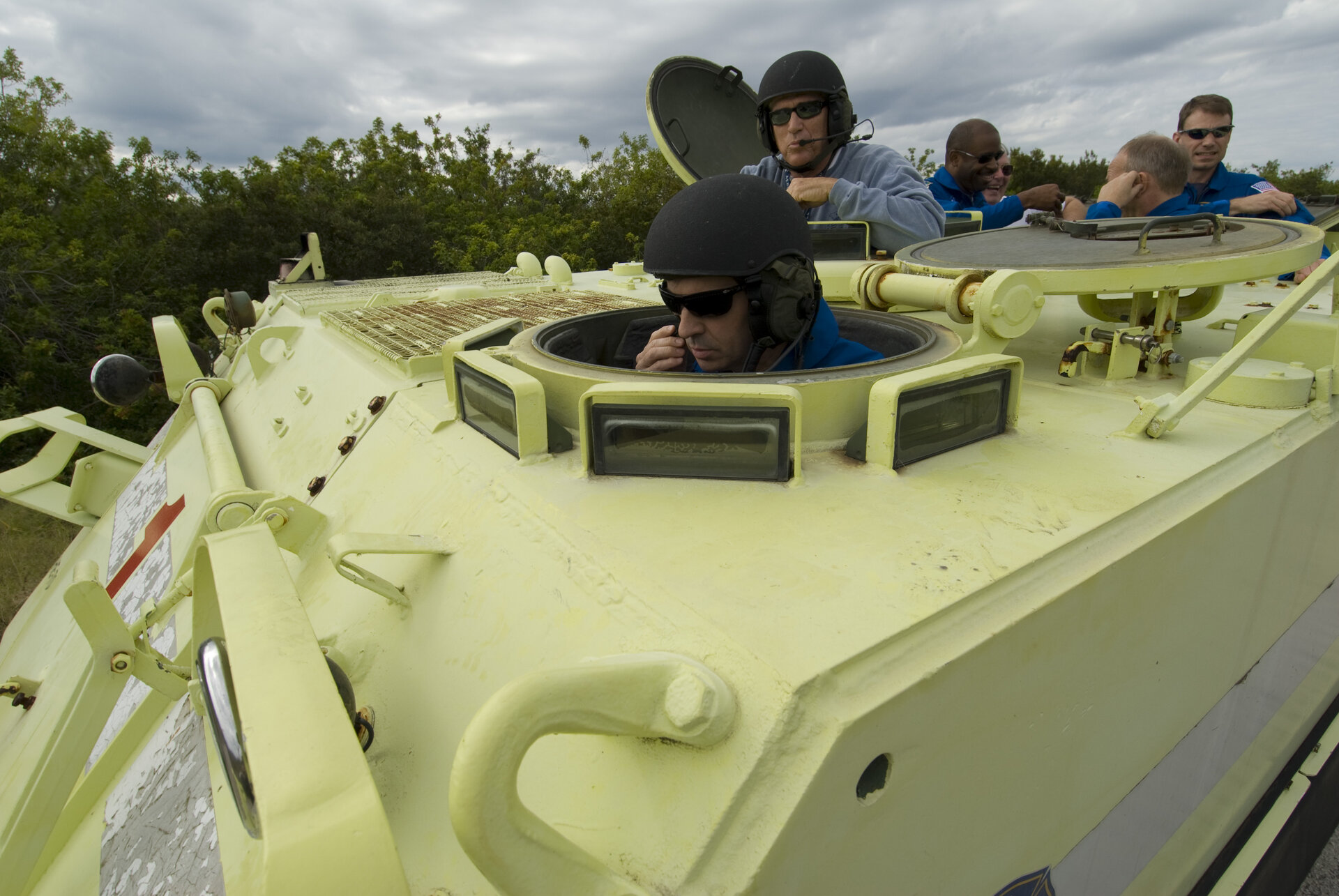 Léopold Eyharts practices driving an emergency evacuation vehicle during training at Kennedy Space Center, Florida