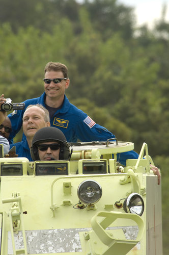 Léopold Eyharts practices driving an emergency evacuation vehicle during training at Kennedy Space Center, Florida