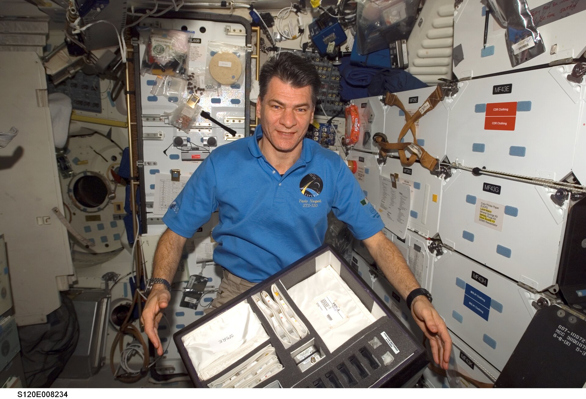 Paolo Nespoli with Spore experiment hardware