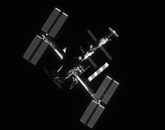 Shuttle Atlantis docked to ISS seen from the ground, June 2007