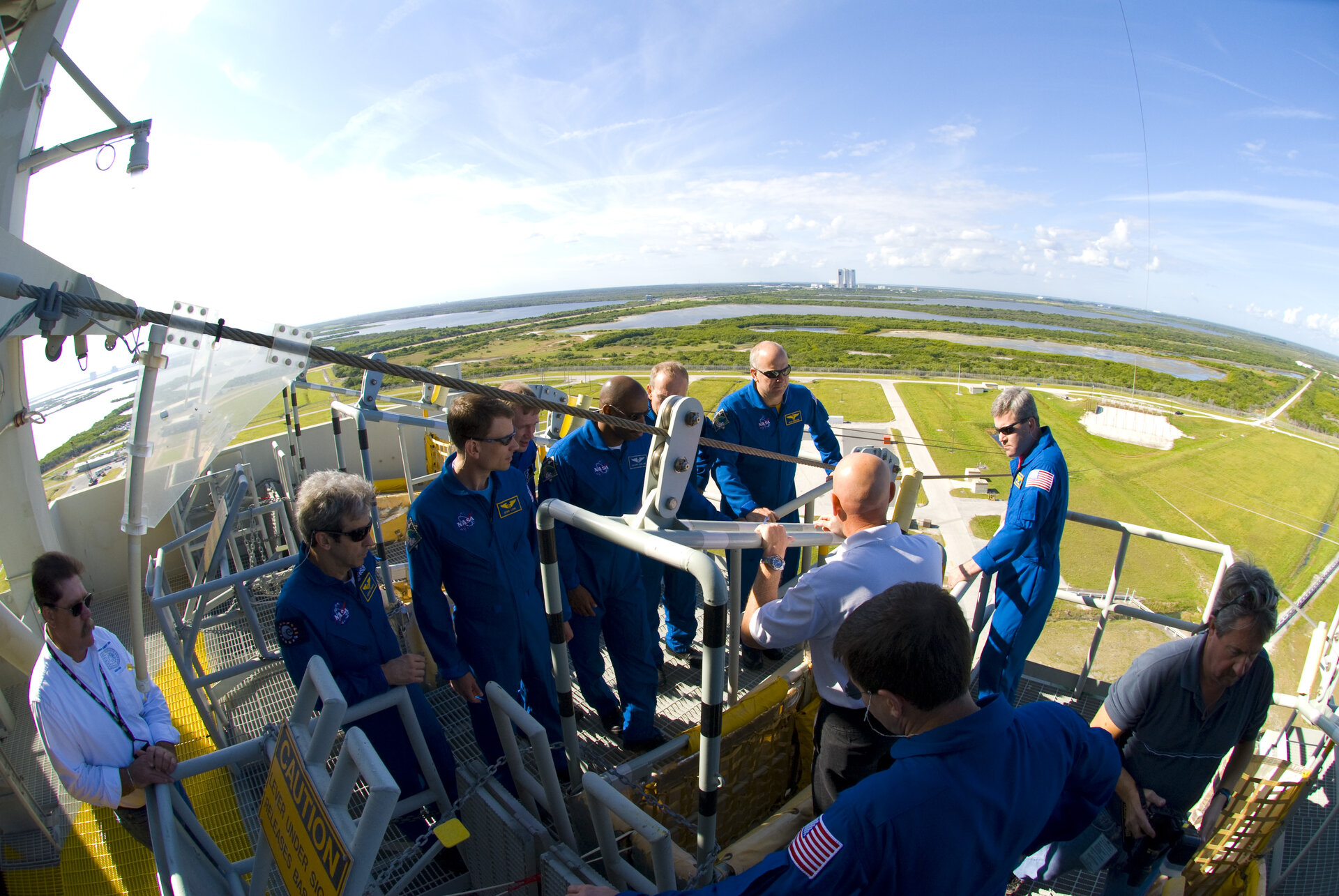 STS-122 mission crew learn how to use the slidewire baskets to evacuate the launch pad in the case of emergency