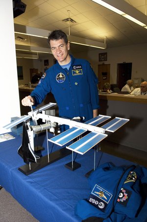 ESA astronaut Paolo Nespoli with ISS scale model