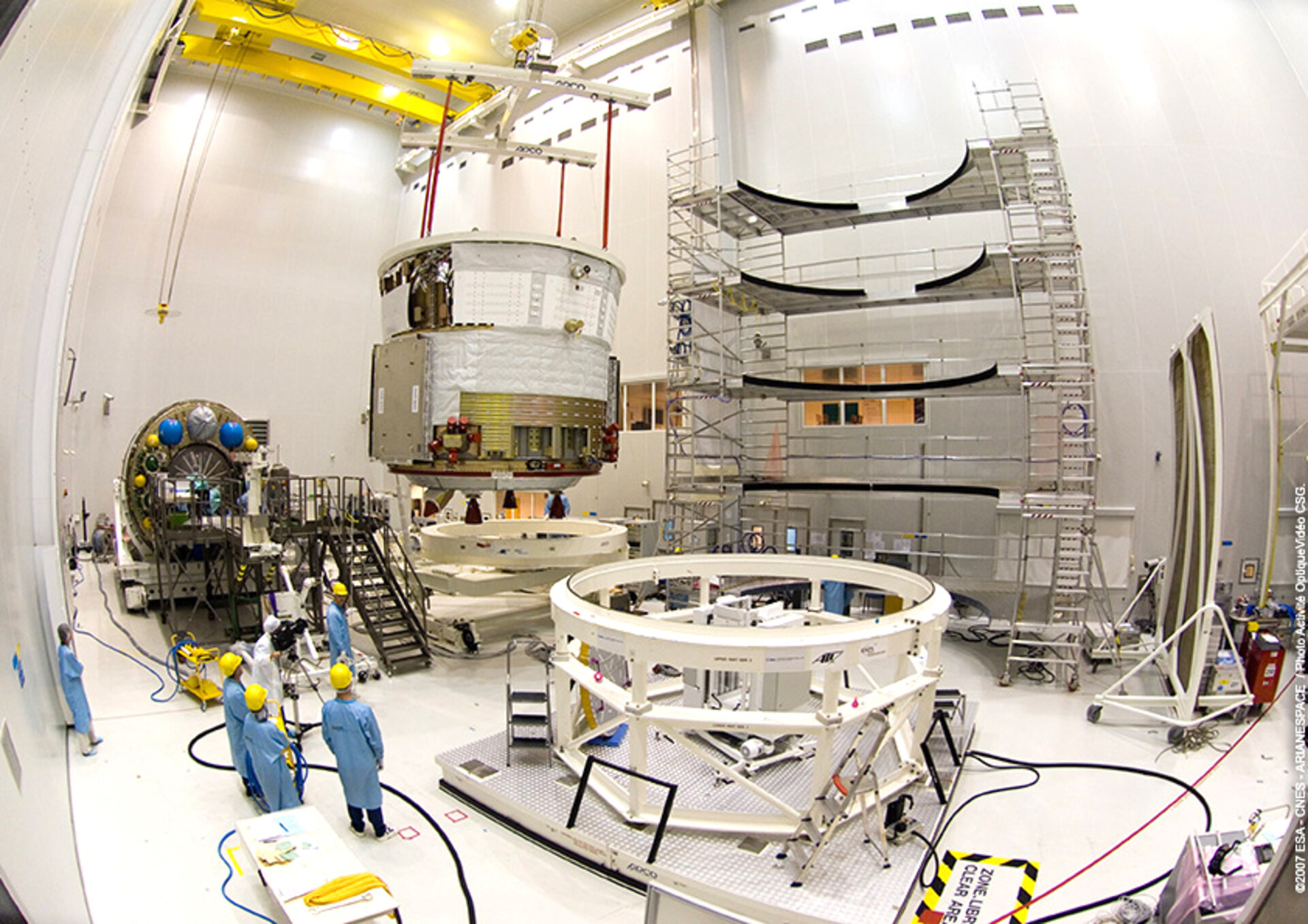 Jules Verne's Propulsion Module is lifted into position ahead of mating with the spacecraft's Integrated Cargo Carrier