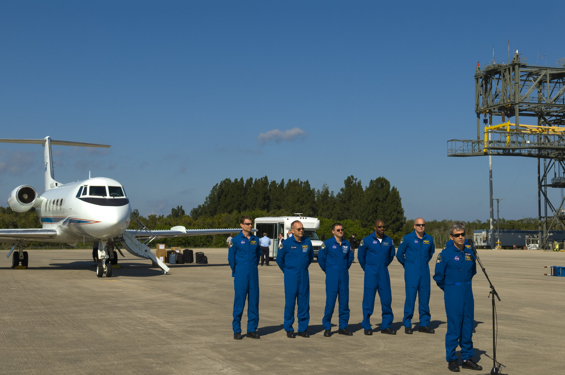 Leopold Eyharts gives a brief speech after arriving at NASA's Kennedy Space Center ahead of the STS-122 mission