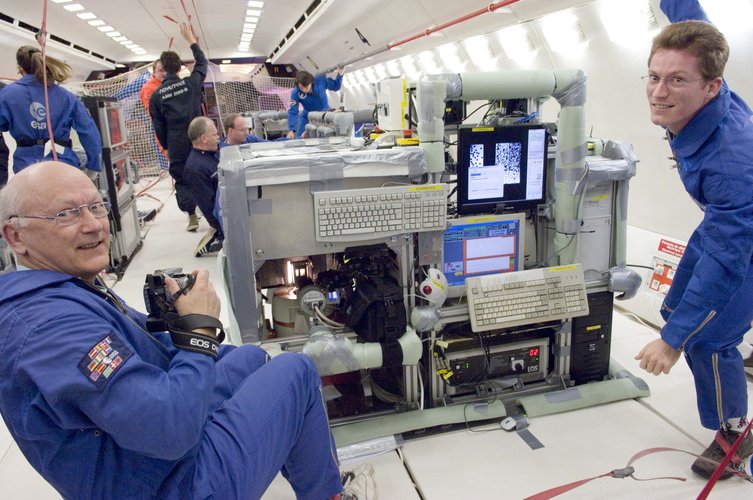 The French research team monitoring their experiment on dense granular matter under vibration