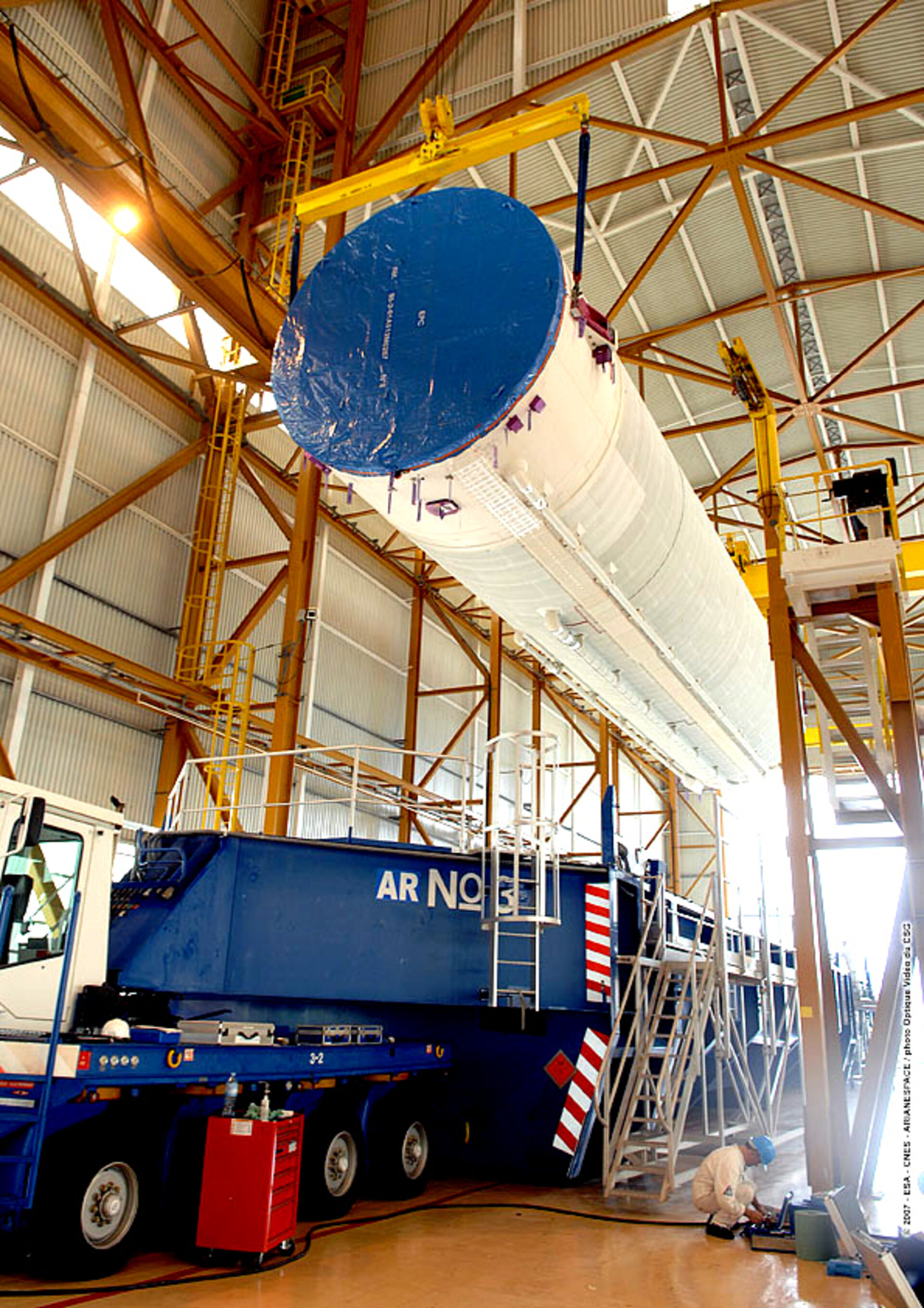 The main cryogenic stage for Jules Verne's Ariane 5 ES launch vehicle arrives in the Launcher Integration Building