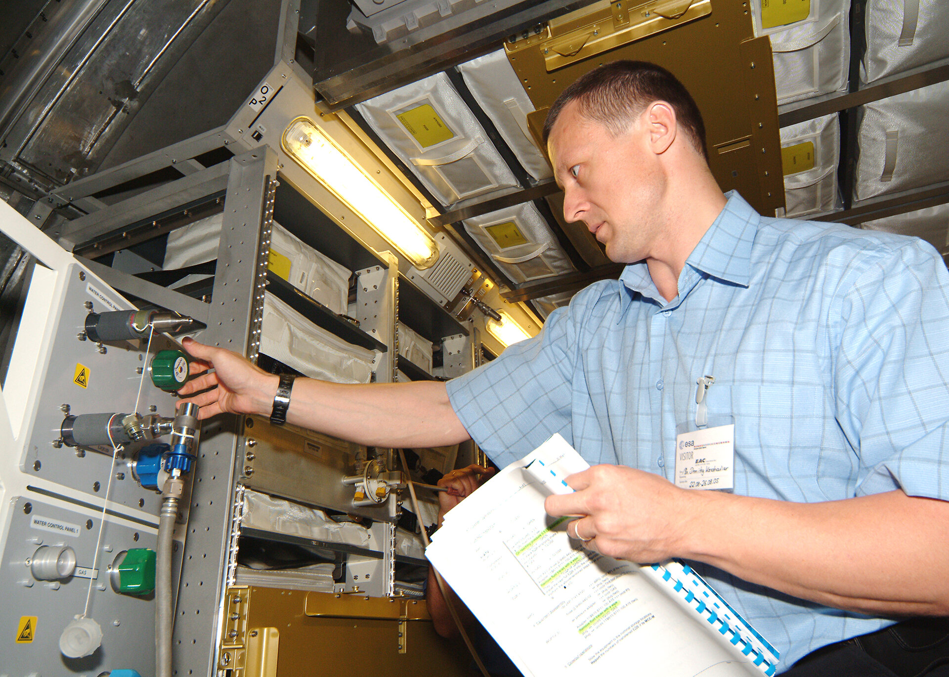 Checking valves on the water control panel inside EAC's ATV mock-up