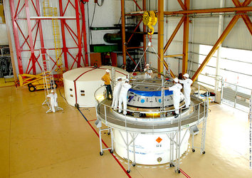 Engineers at Europe's Spaceport in Kourou, French Guiana, prepare the Ariane 5 ES ATV for the Jules Verne flight