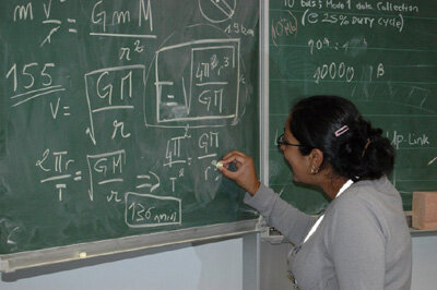 A student works out some theories at the the 2007 Summer School