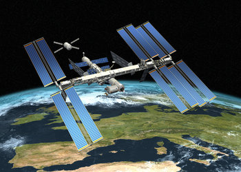 Artist's impression of ESA's Automated Transfer Vehicle coming into close proximity with the ISS