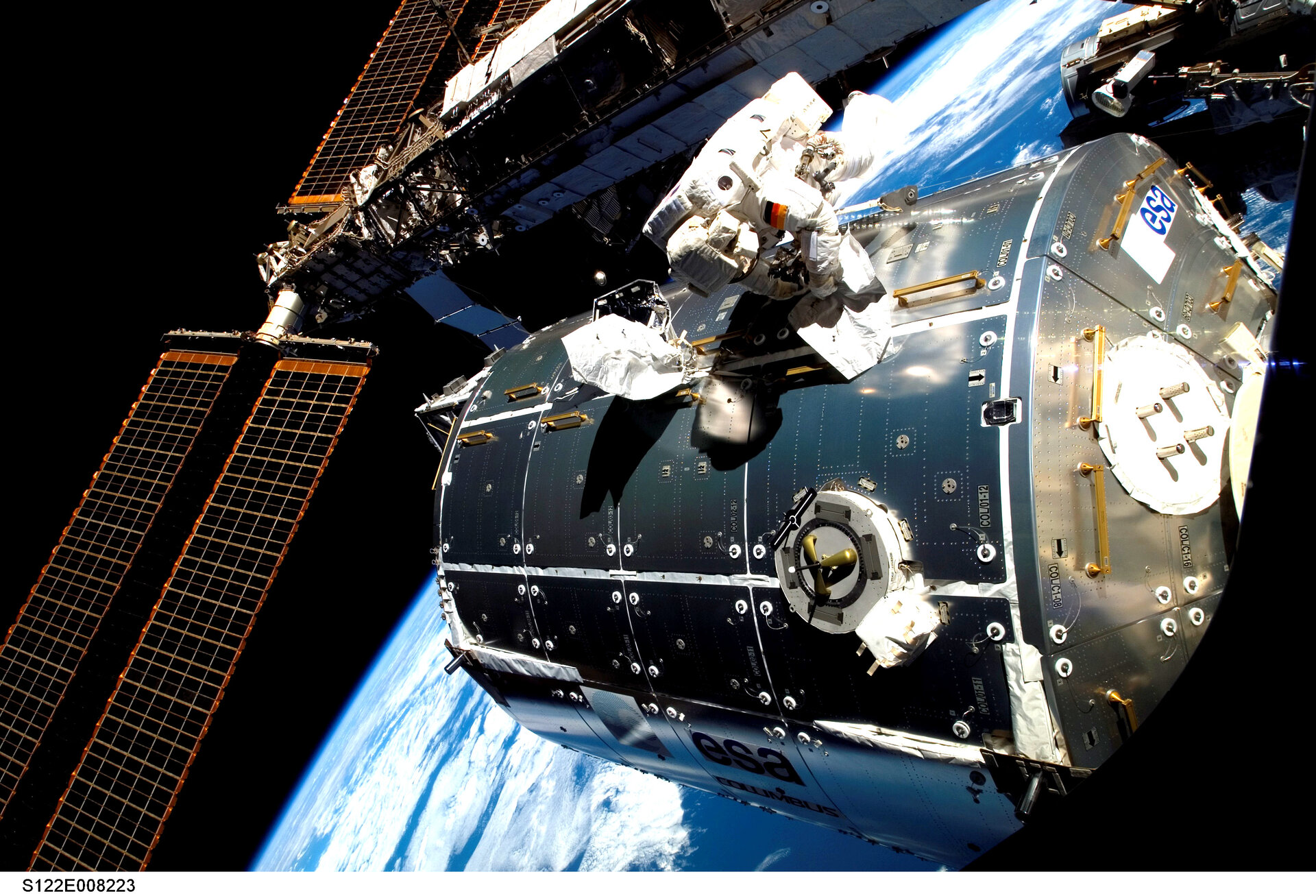 ESA astronaut Hans Schlegel works on Columbus exterior during the second spacewalk of the STS-122 mission