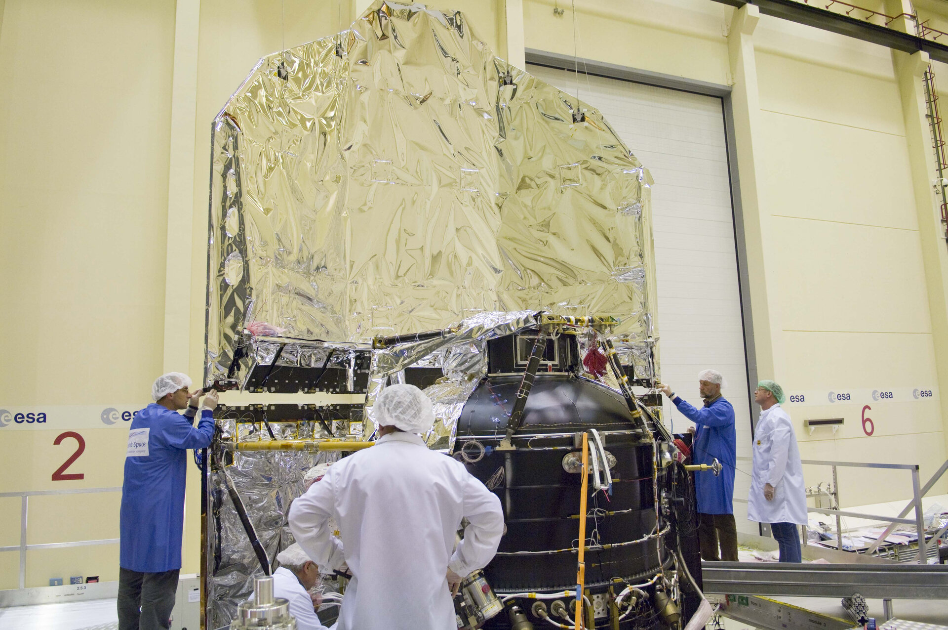 Sunshield being assembled with the solar array