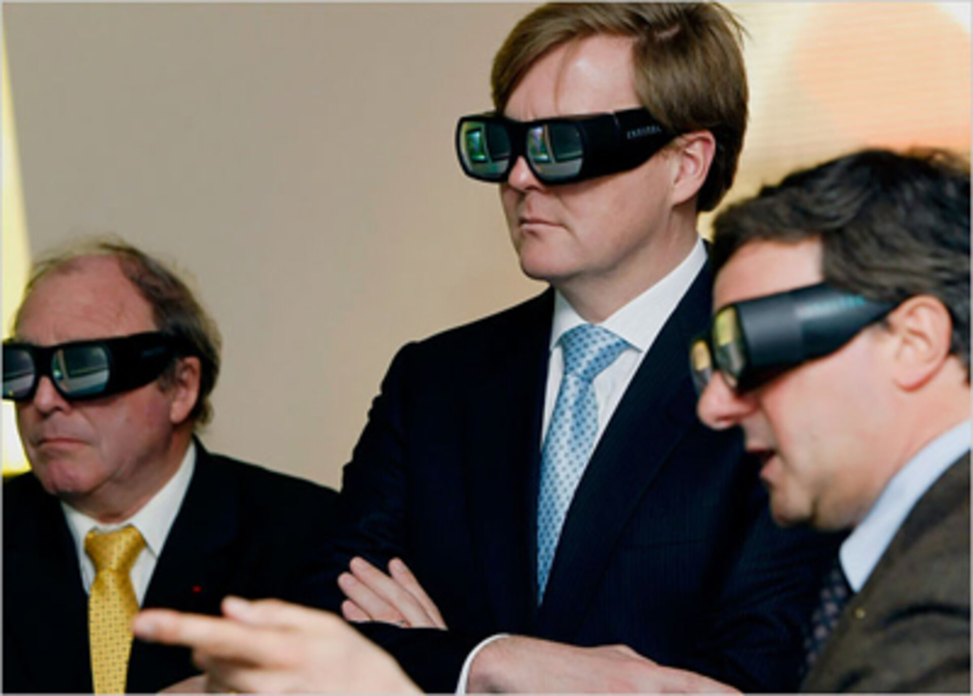 The Prince (centre) views the 3-D simulation in the CDF
