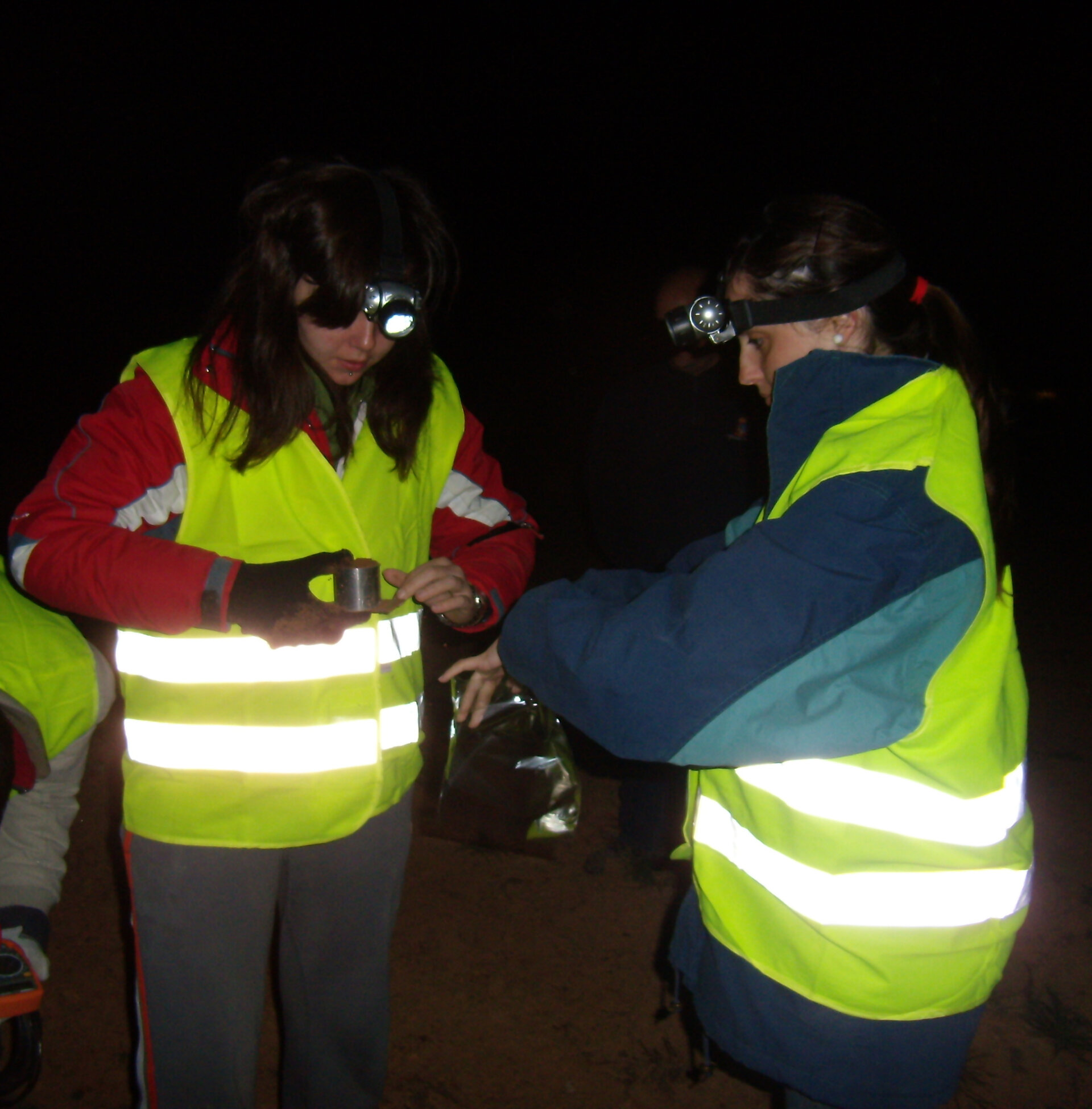 Taking soil samples at night