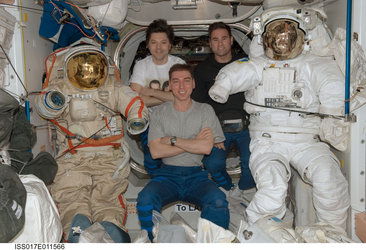 Expedition 17 with a Russian Orlan spacesuit (left) and and Extravehicular Mobility Unit