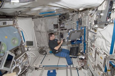NASA astronaut Gregory Chamitoff inside Columbus