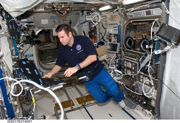 NASA astronaut Greg Chamitoff in Columbus laboratory