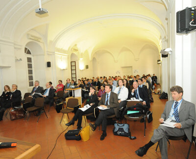 Listening to a presentation inside the Aula Magna