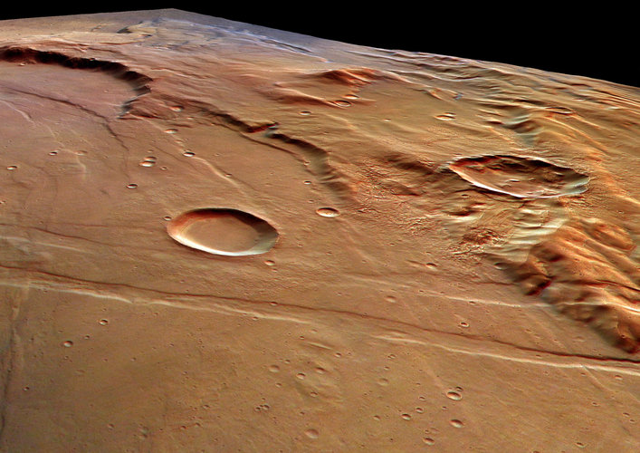 A heavily eroded impact crater at Solis Planum, in the Thaumasia region of Mars, seen by ESA's Mars Express spacecraft