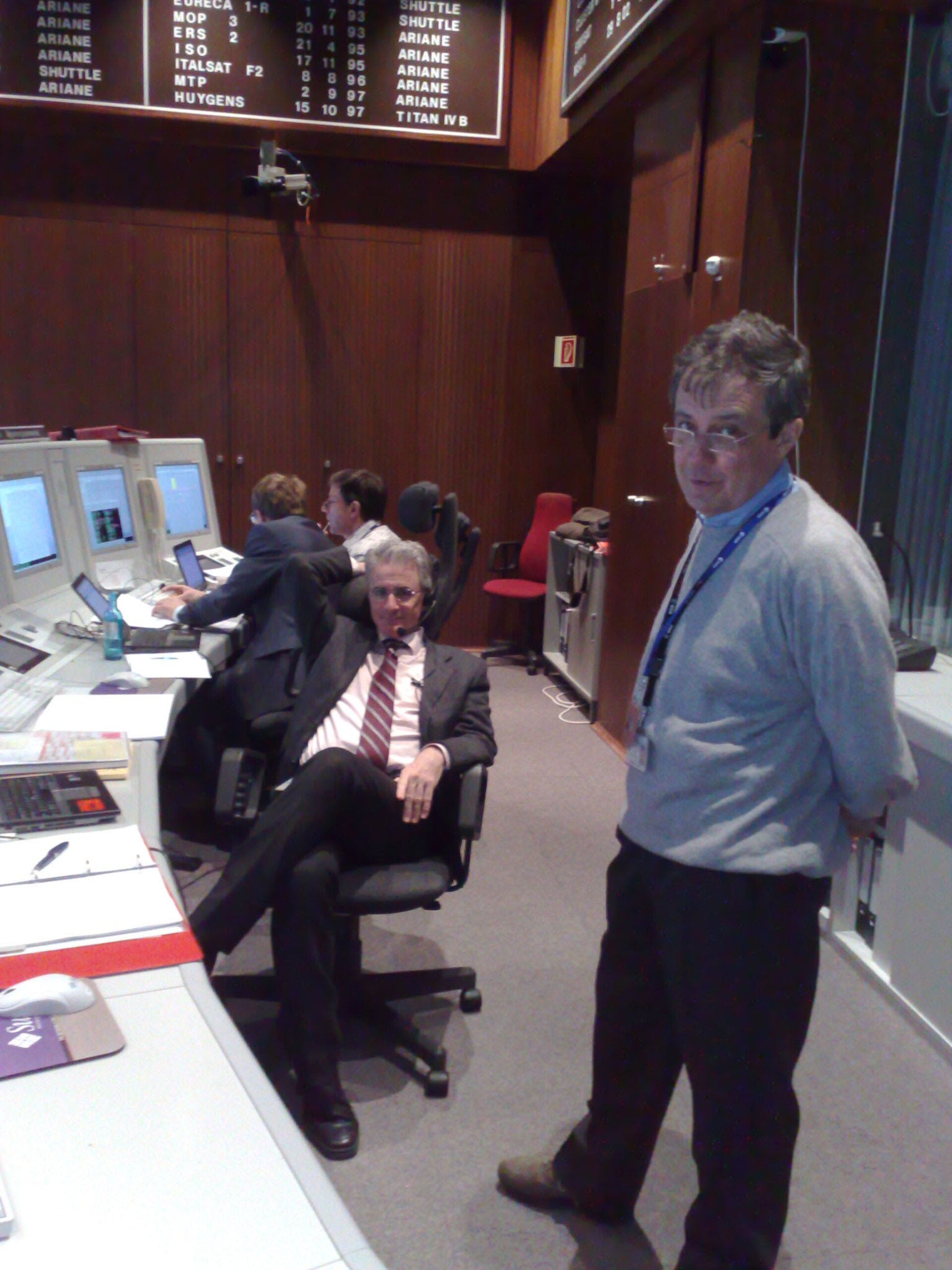 Deputy Flight Operations Director P. Ferri (seated) and FOD Pier-Paolo Emanuelli (standing)