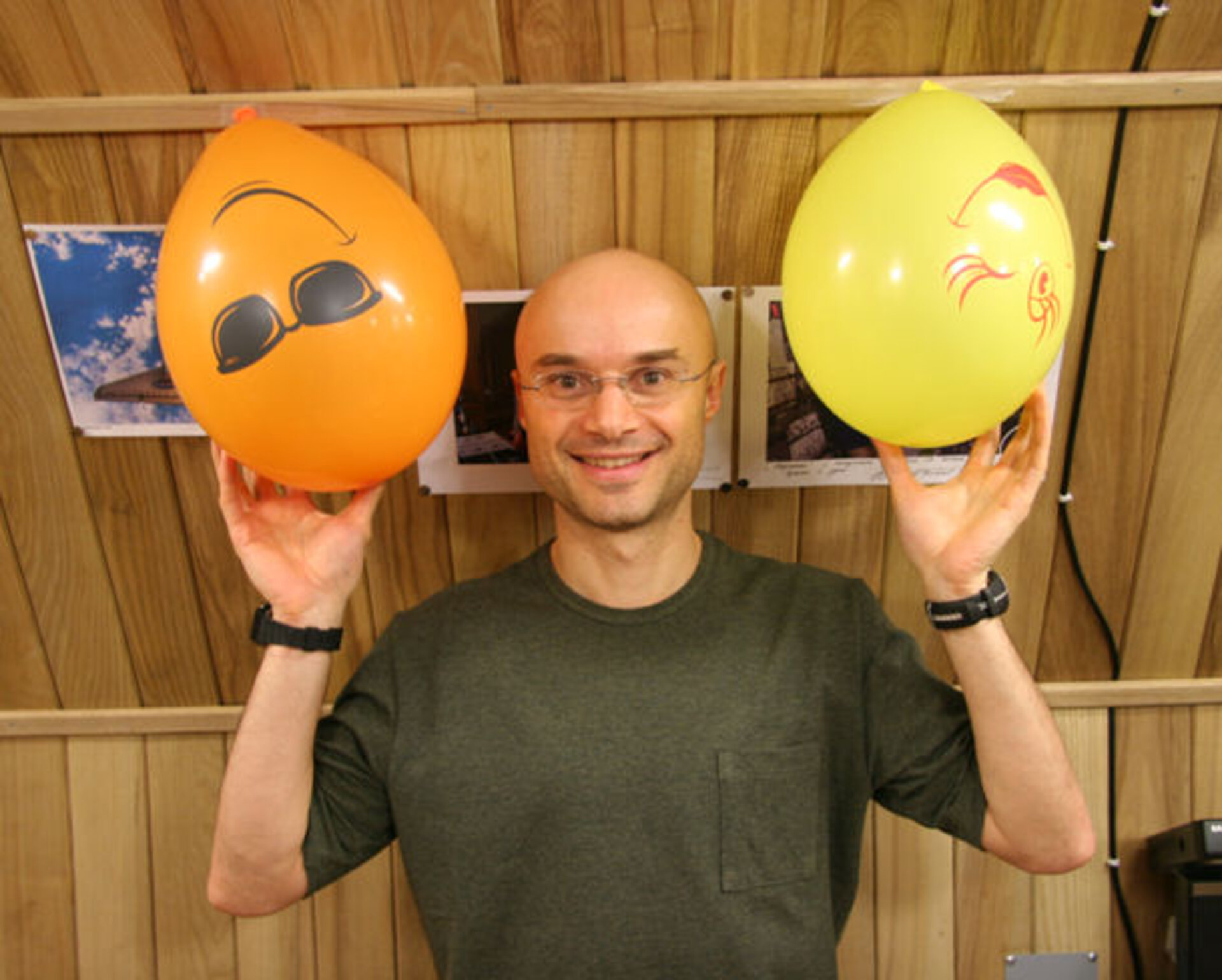 Cyrille with two of the balloons used to decorate the module for Oliver's birthday