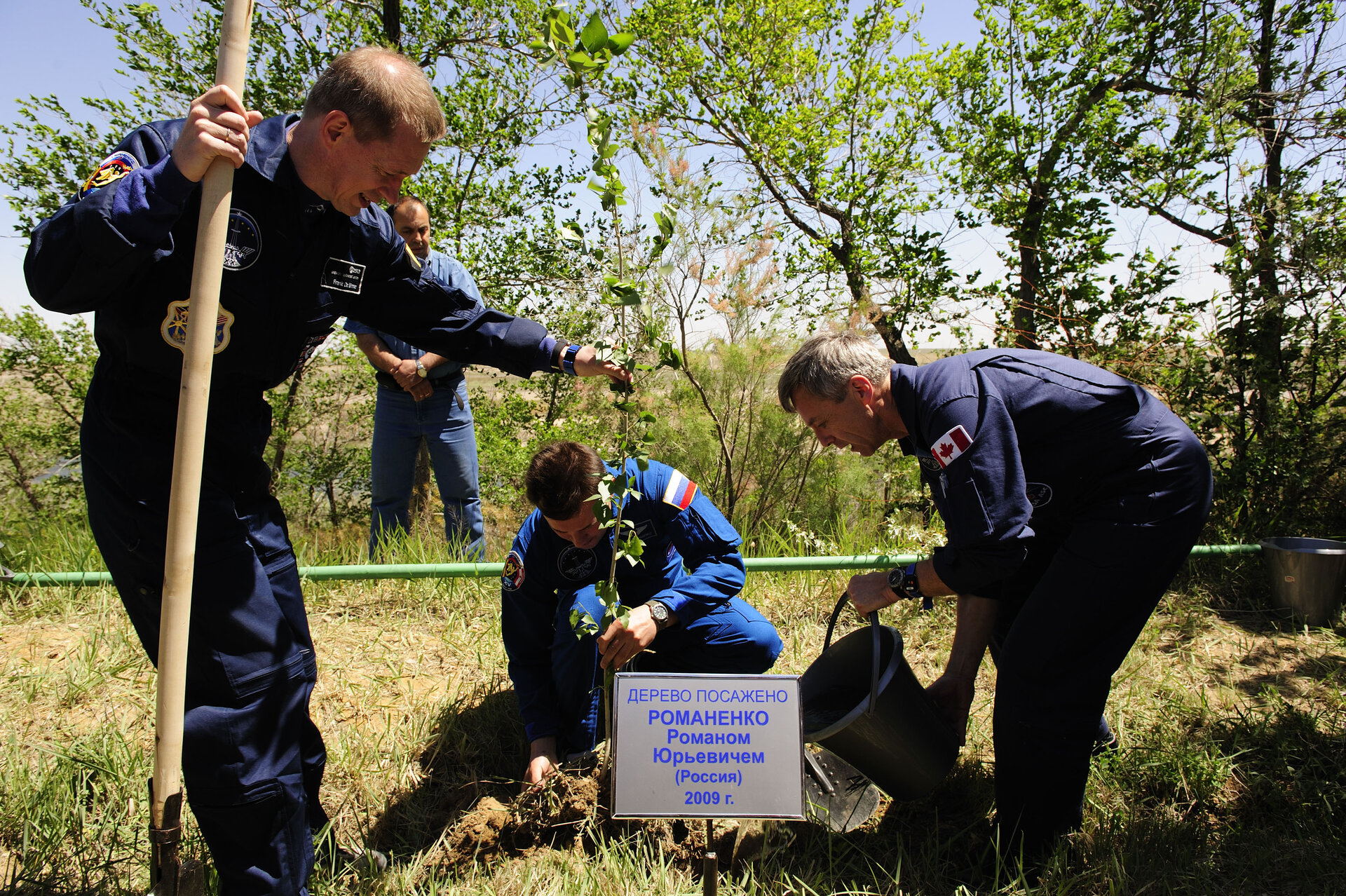 The Soyuz TMA-15 crew take part in the traditional tree-planting ceremony ahead of their launch to the ISS