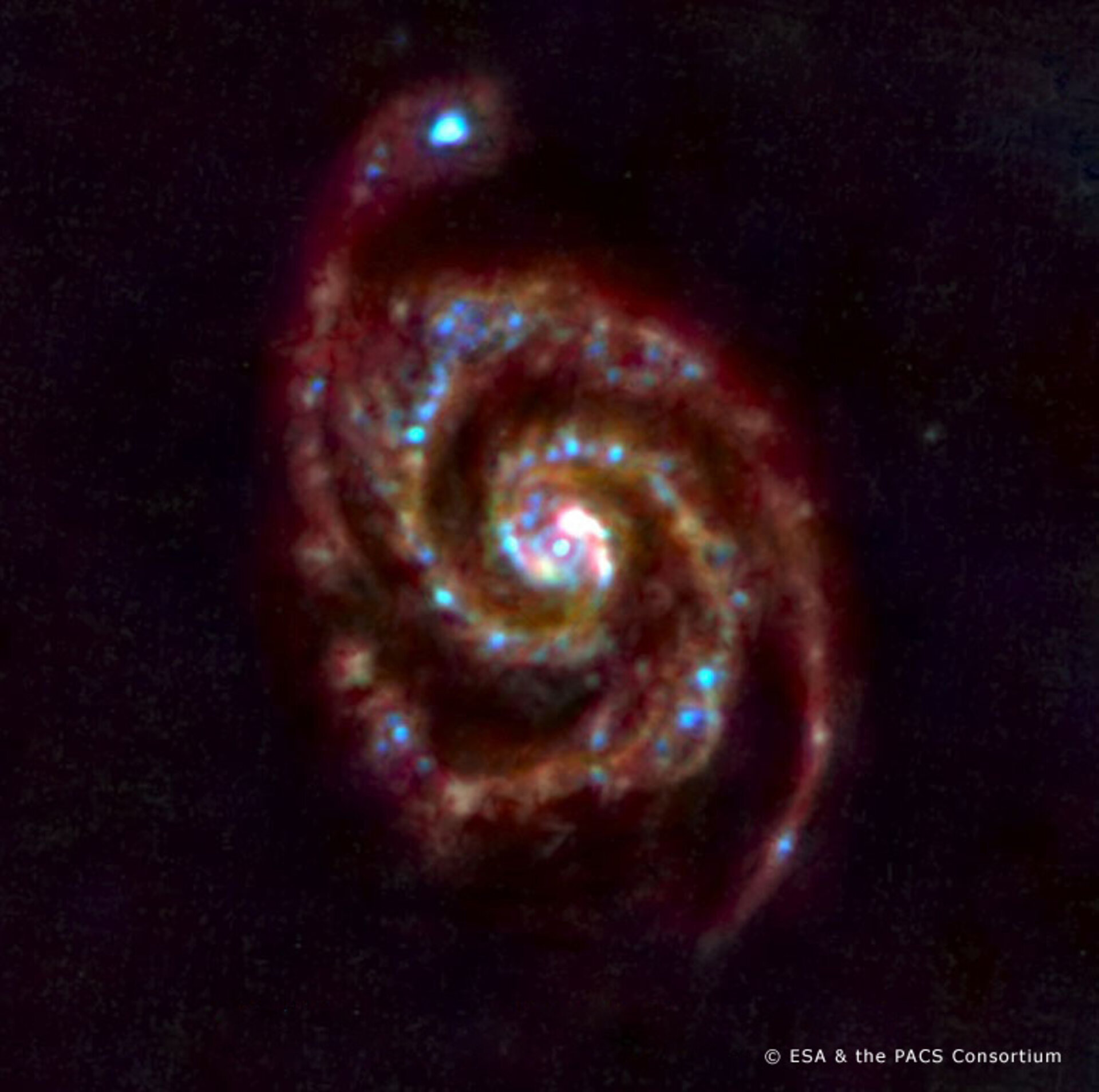 Spiralgalaksen Messier 51 fotografert av ESAs nye romteleskop Herschel