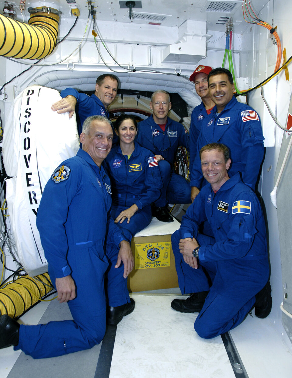 STS-128 crew with Space Shuttle Discovery during final preflight training at KSC