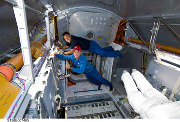 At work inside the Leonardo Multi-Purpose Logistics Module during the STS-128 mission
