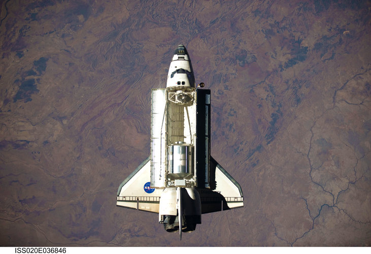 Space Shuttle Discovery approaches ISS for rendezvous and docking