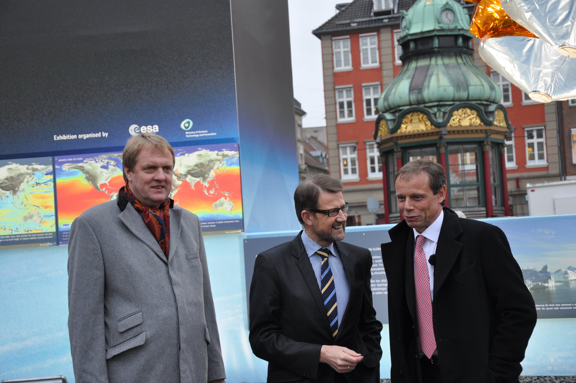 P. Hulsroj, H. Sander and C. Fuglesang in front of ESA's exhibit