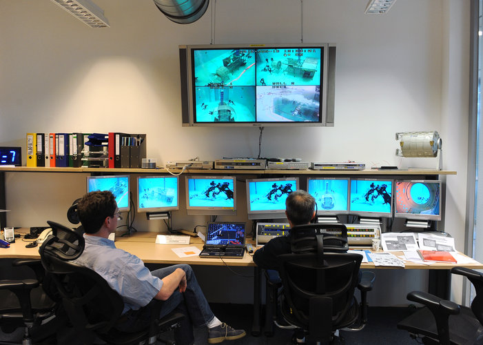 Dive supervisor and test director monitoring the activities