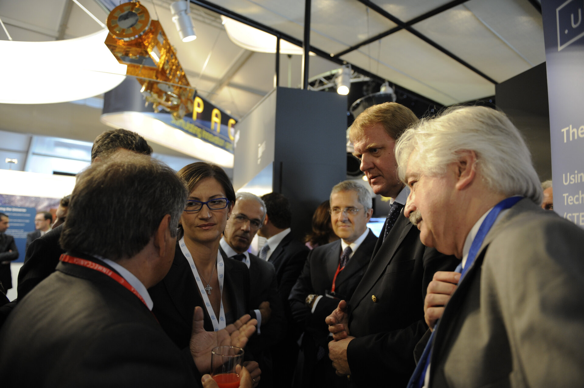 E. Saggese, M. Gelmini and D. Southwood visiting the ESA stand