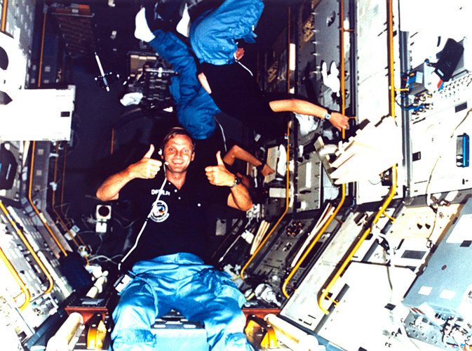 Messerschmid gives thumbs up during STS-61A flight