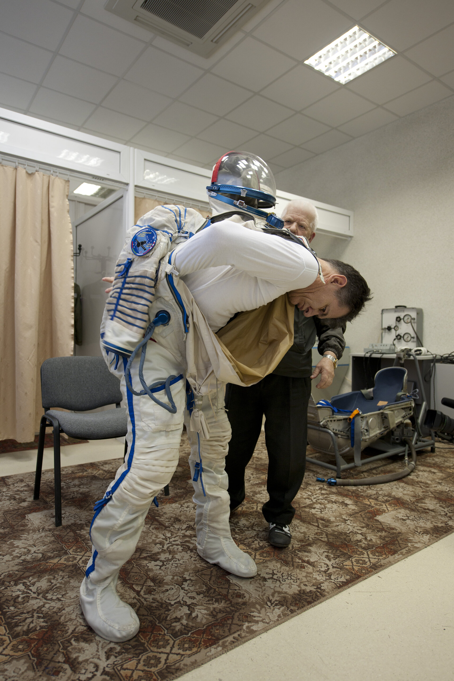 Paolo Nespoli trying on his Russian Sokol suit