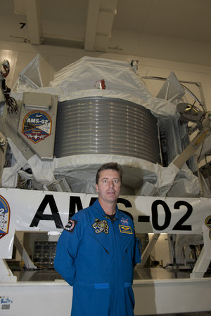 Roberto Vittori in front of AMS-02