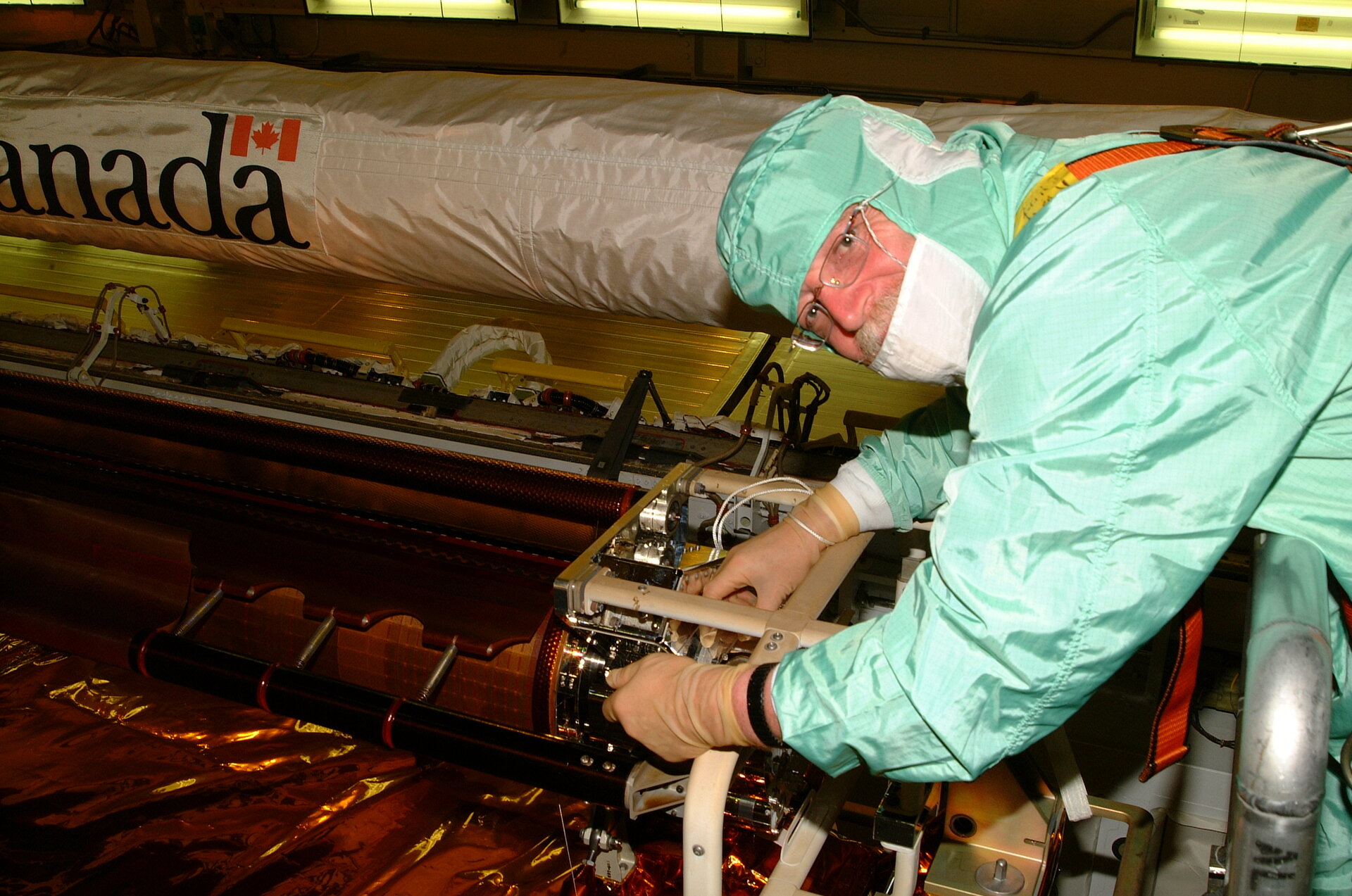Lothar Gerlach checking Hubble solar array in Shuttle cargo bay