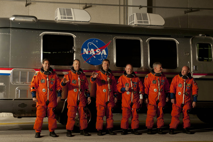 STS-134 crew walk out