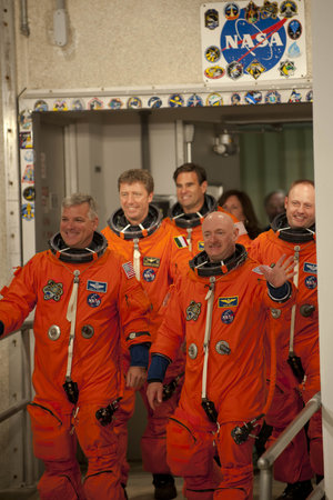 STS-134 crew walk out