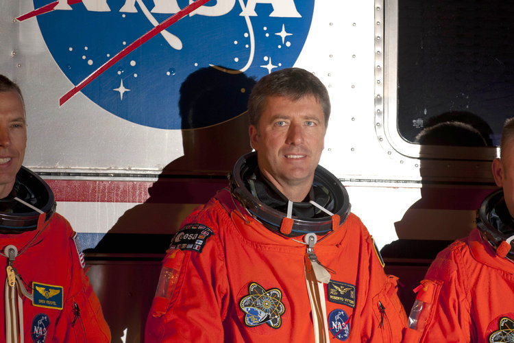 STS-134 crew walk out