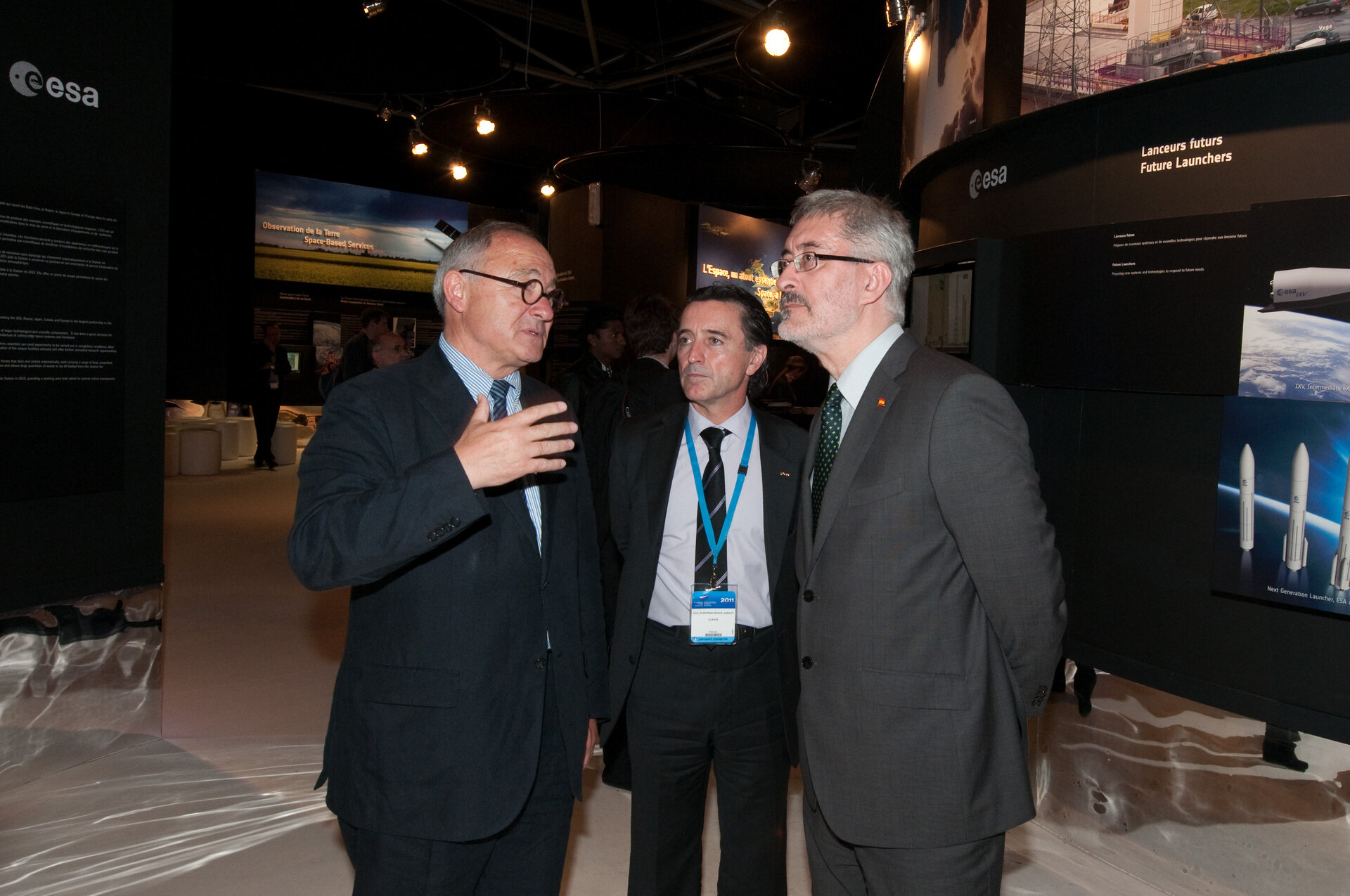 Antonio Avila Cano, Fernando Doblas, and Jean-Jacques Dordain visit the ESA pavilion