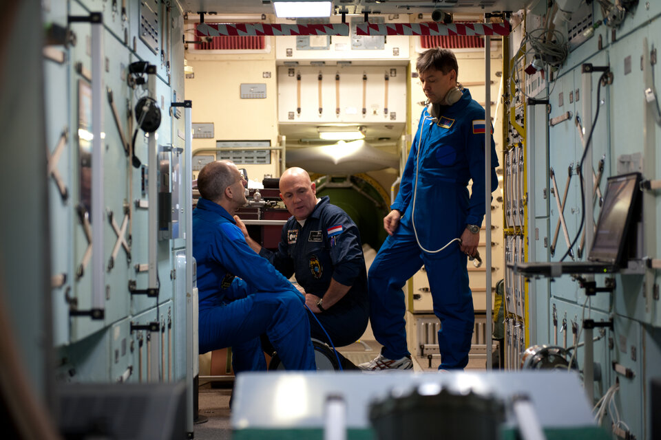 André (middle), Don (left) and Oleg in a mockup of the Zvezda module at the GCTC.