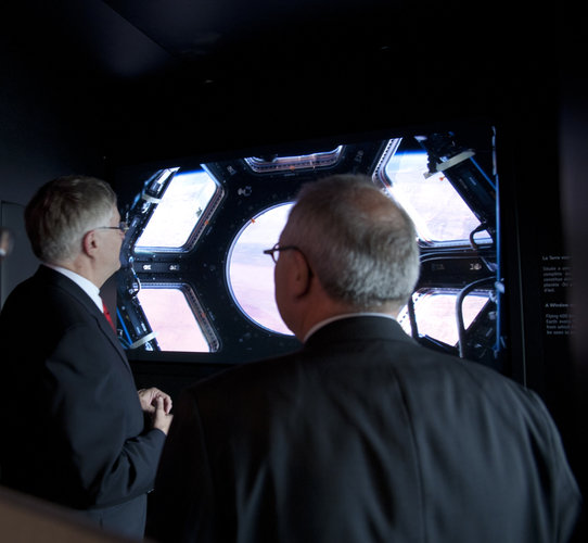 ESA DG & P. Hintze looking out the Cupola