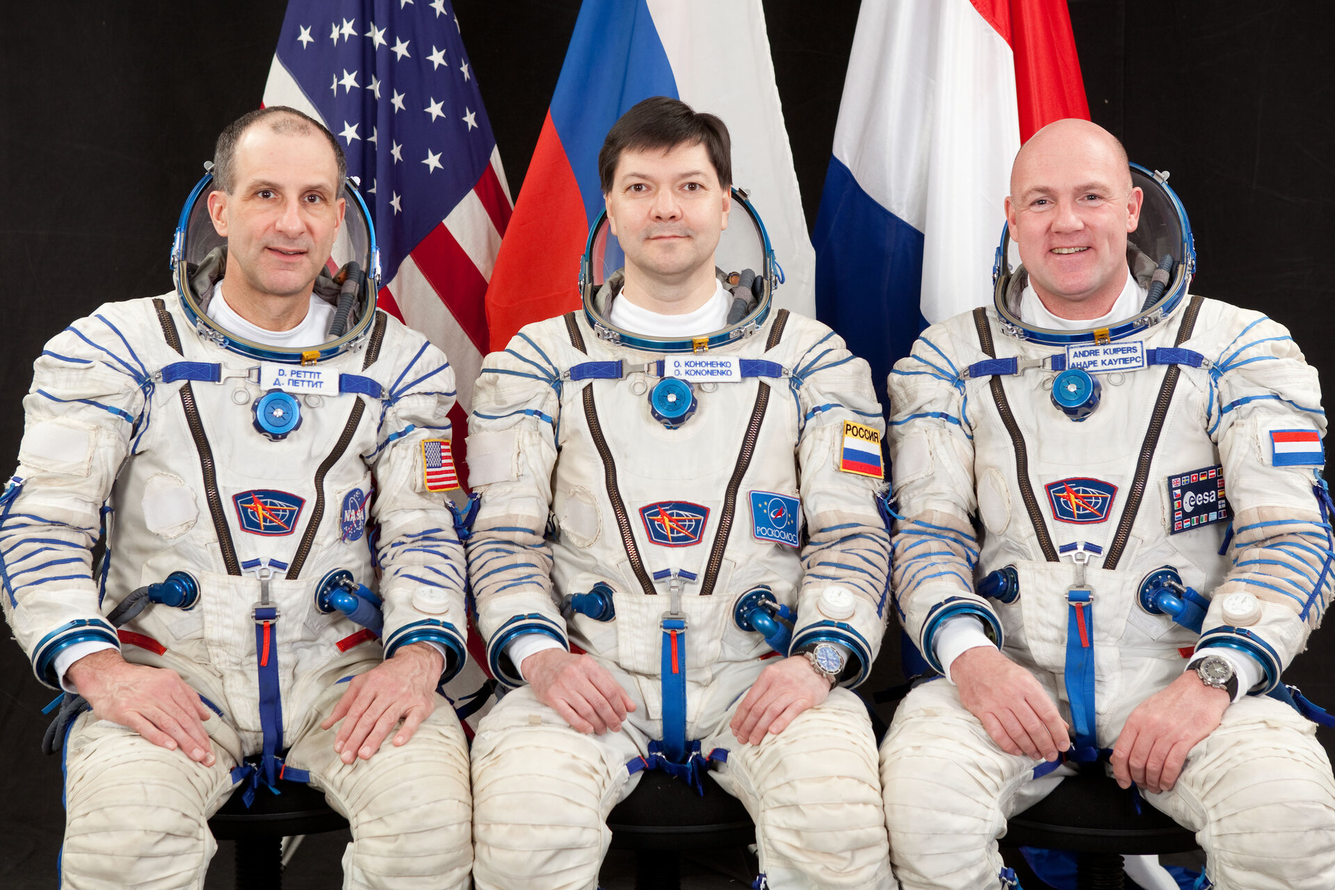 Vlnr: Astronaut Don Pettit, Kosmonaut Oleg Kononenko, ESA-Astronaut André Kuipers
