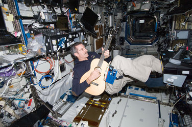 Expedition 30's Dan Burbank with guitar