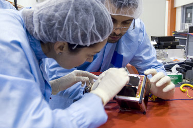 e-st@r team clean their CubeSat before integration