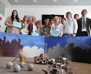 Students with their cityscape backdrop