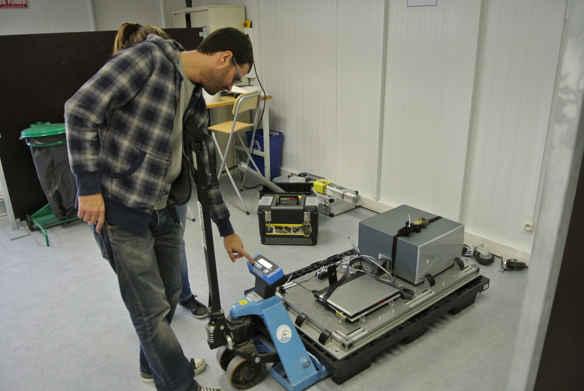 LINVforROS students weighing their experiment