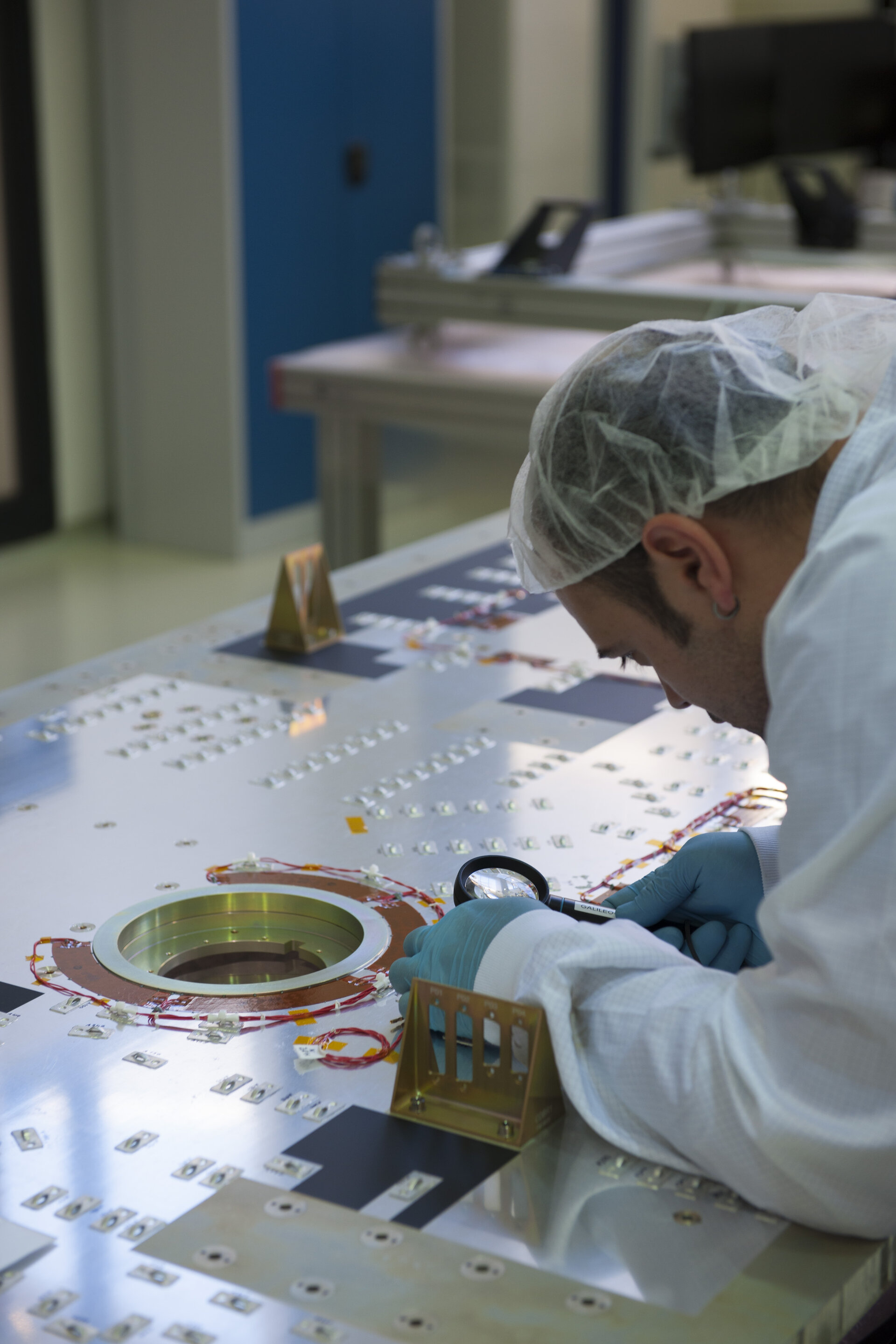 Engineer working on one of the first six Galileo FOC satellites at OHB
